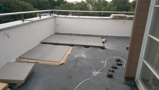 Rénovation de terrasse avec utilisation de terrasse surélevée