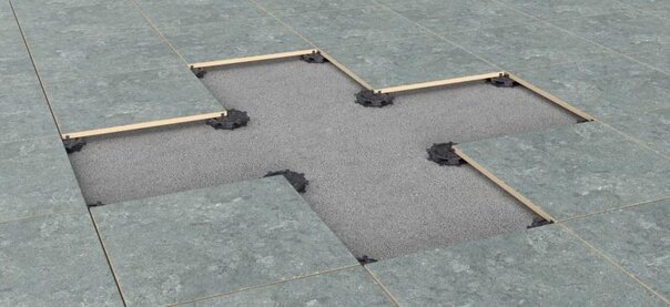 Visualisation d'une terrasse surélevée sur plots réglables avec utilisation de dalles.