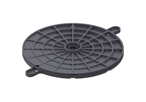 Base circulaire grise de régulateur d'inclinaison pour plots réglables de terrasse.